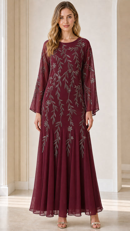 Front view of model wearing burgundy sequin embroidered maxi dress