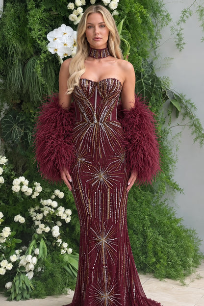 Burgundy wine sequin sweetheart mermaid gown with matching feather trim