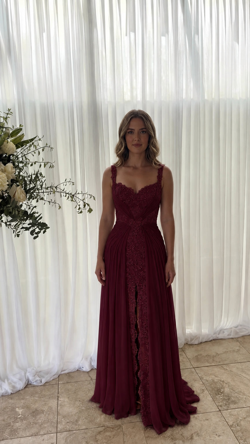 Front view of model wearing burgundy wine red chiffon evening gown