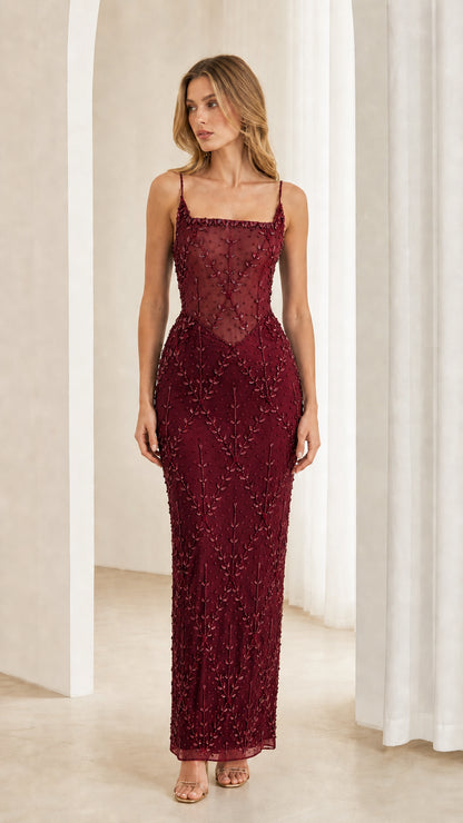 Front view of model wearing Burgundy wine beaded corset evening dress