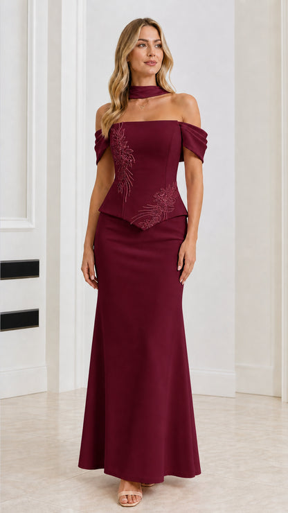 Front view of Burgundy off-the-shoulder beaded peplum maxi dress