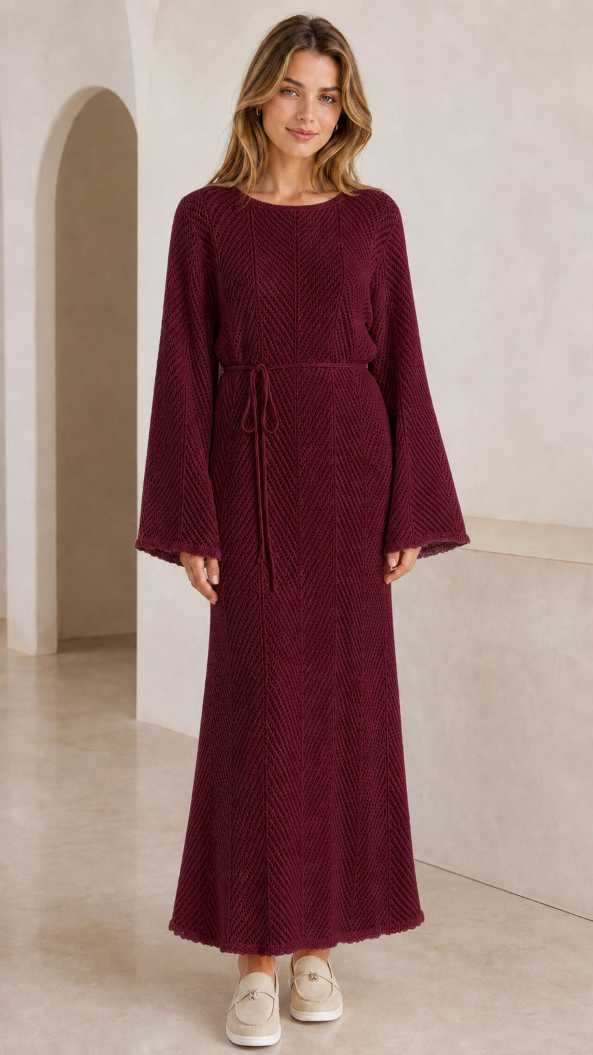 Front view of model wearing burgundy wine textured knit bell sleeve maxi dress