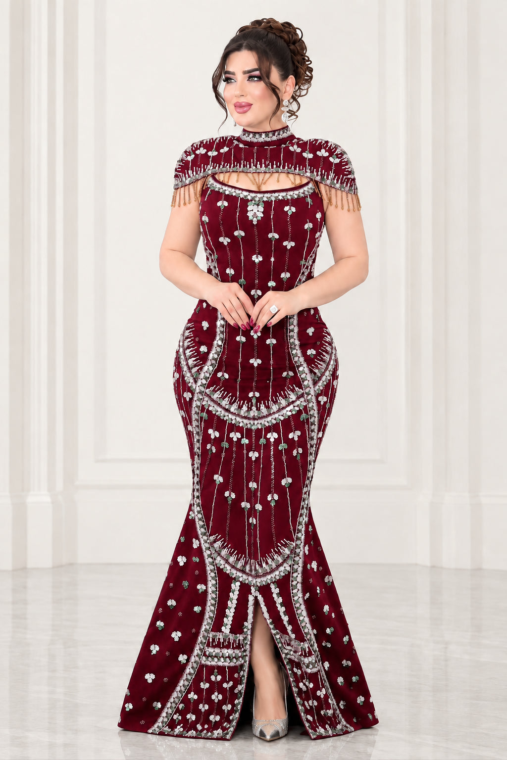 Full-length view of burgundy wine red embellished evening gown with beaded fringe detail