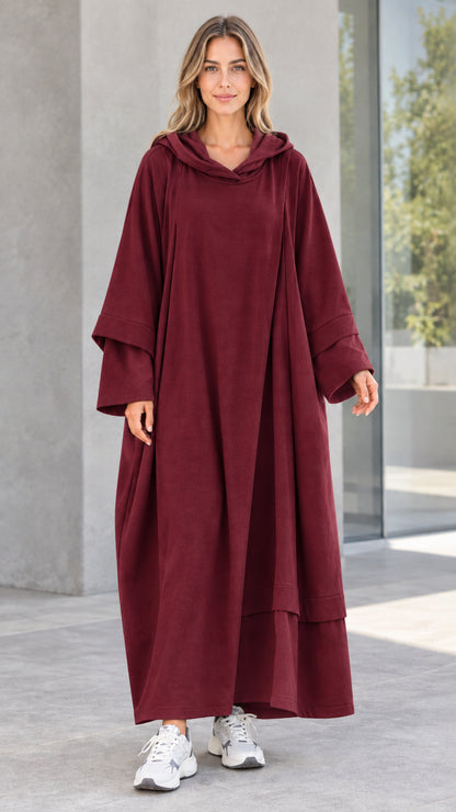 Front view of woman wearing burgundy wine red oversized hooded maxi dress