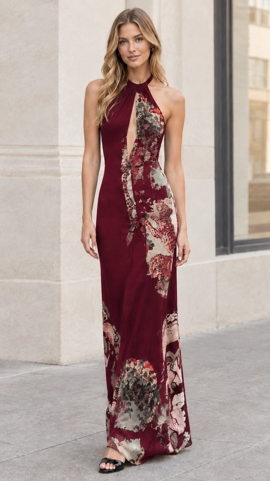 Model wearing burgundy red floral print halter keyhole maxi dress