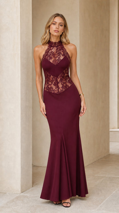 Model wearing Burgundy halter neck evening dress