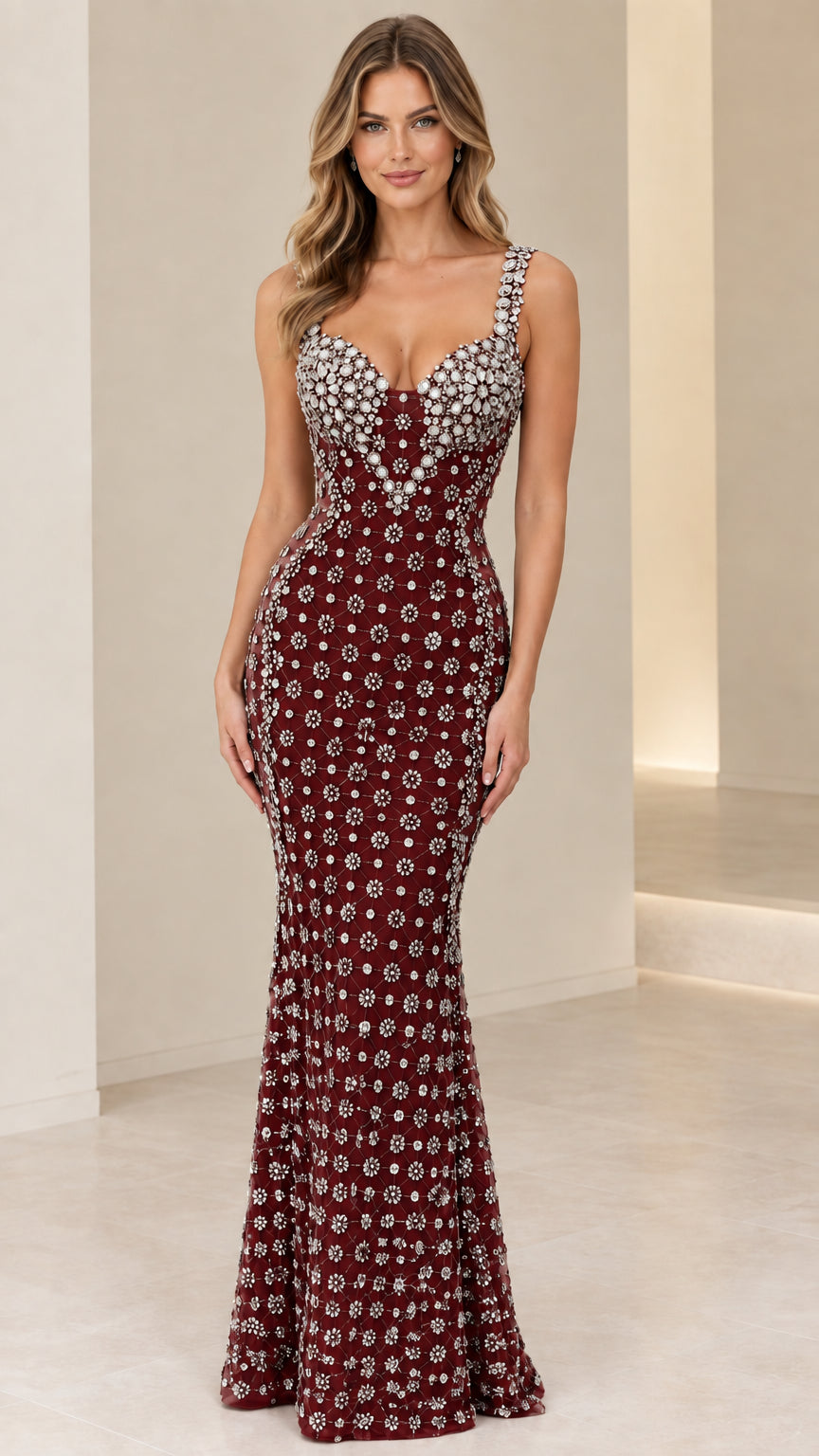Model wearing burgundy red rhinestone-embellished sweetheart mermaid evening gown