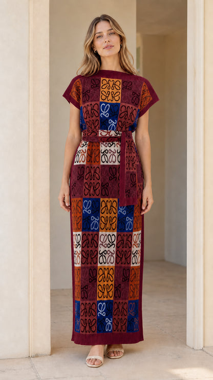 Model wearing geometric jacquard knit column maxi dress in Burgundy Multi