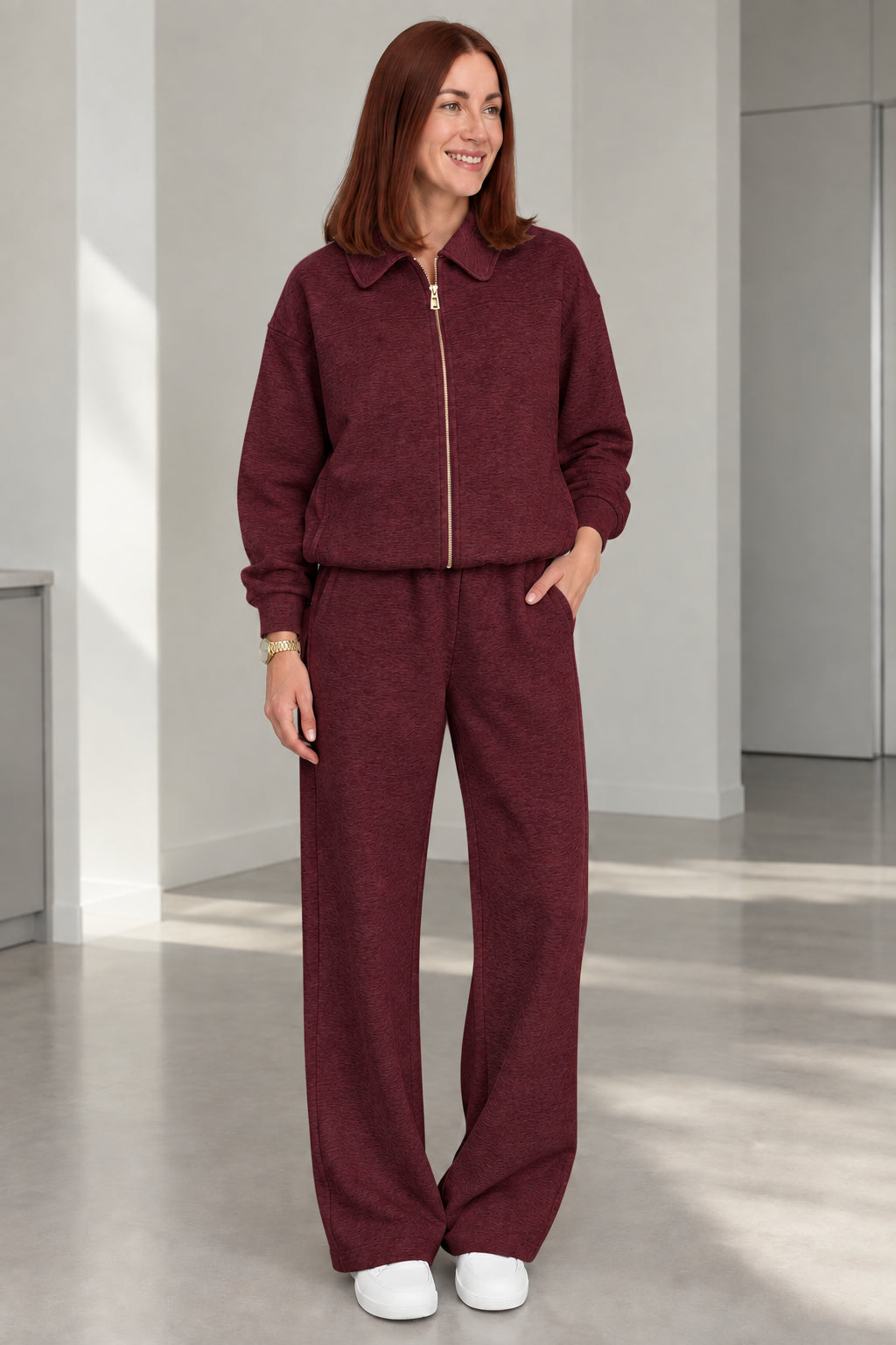 Woman wearing Burgundy two-piece casual lounge tracksuit