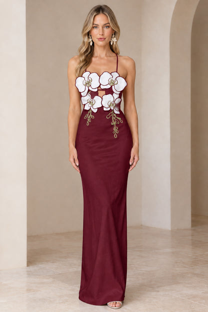 Front view of model wearing Burgundy wine backless floral maxi dress