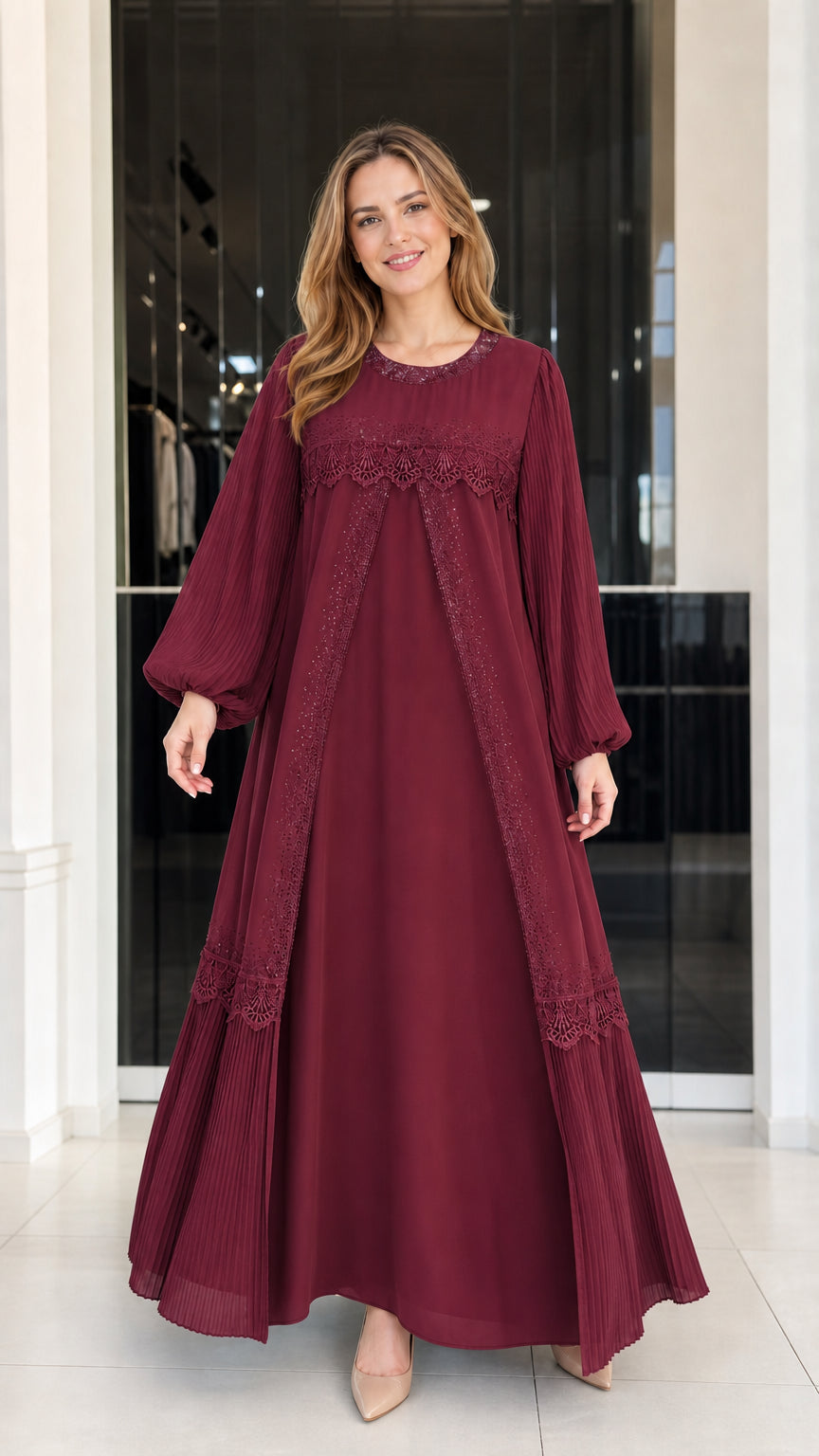 Front view of woman wearing burgundy wine red pleated sleeve lace maxi gown
