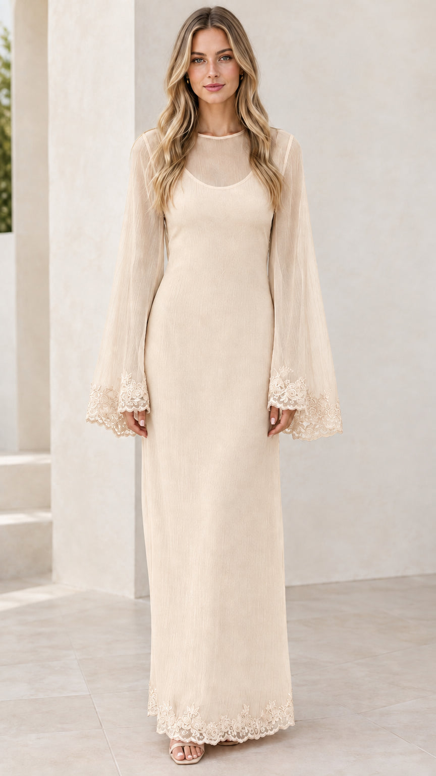 Front view of champagne cream sheer overlay evening maxi gown