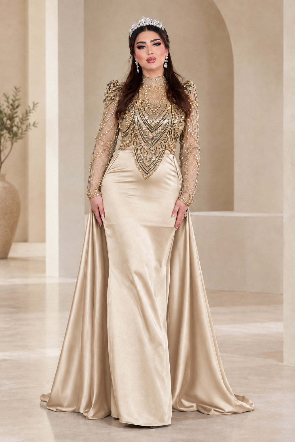 Front view of champagne gold formal evening gown with shimmering embroidered top