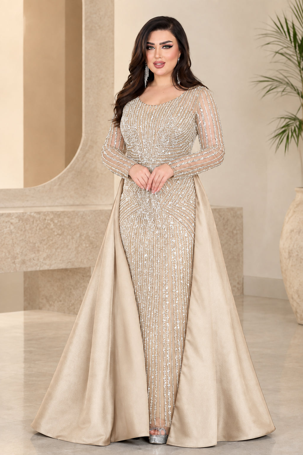 Champagne gold embellished evening gown with sheer long sleeves and satin overskirt