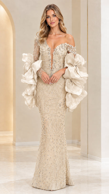 Model wearing Champagne gold beaded formal evening gown with voluminous sleeves