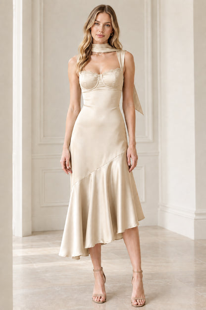 Full-length front view of champagne ivory satin bustier asymmetrical midi dress with scarf