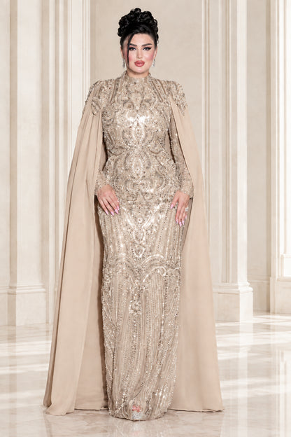 Model wearing champagne gold embellished high neck cape evening gown