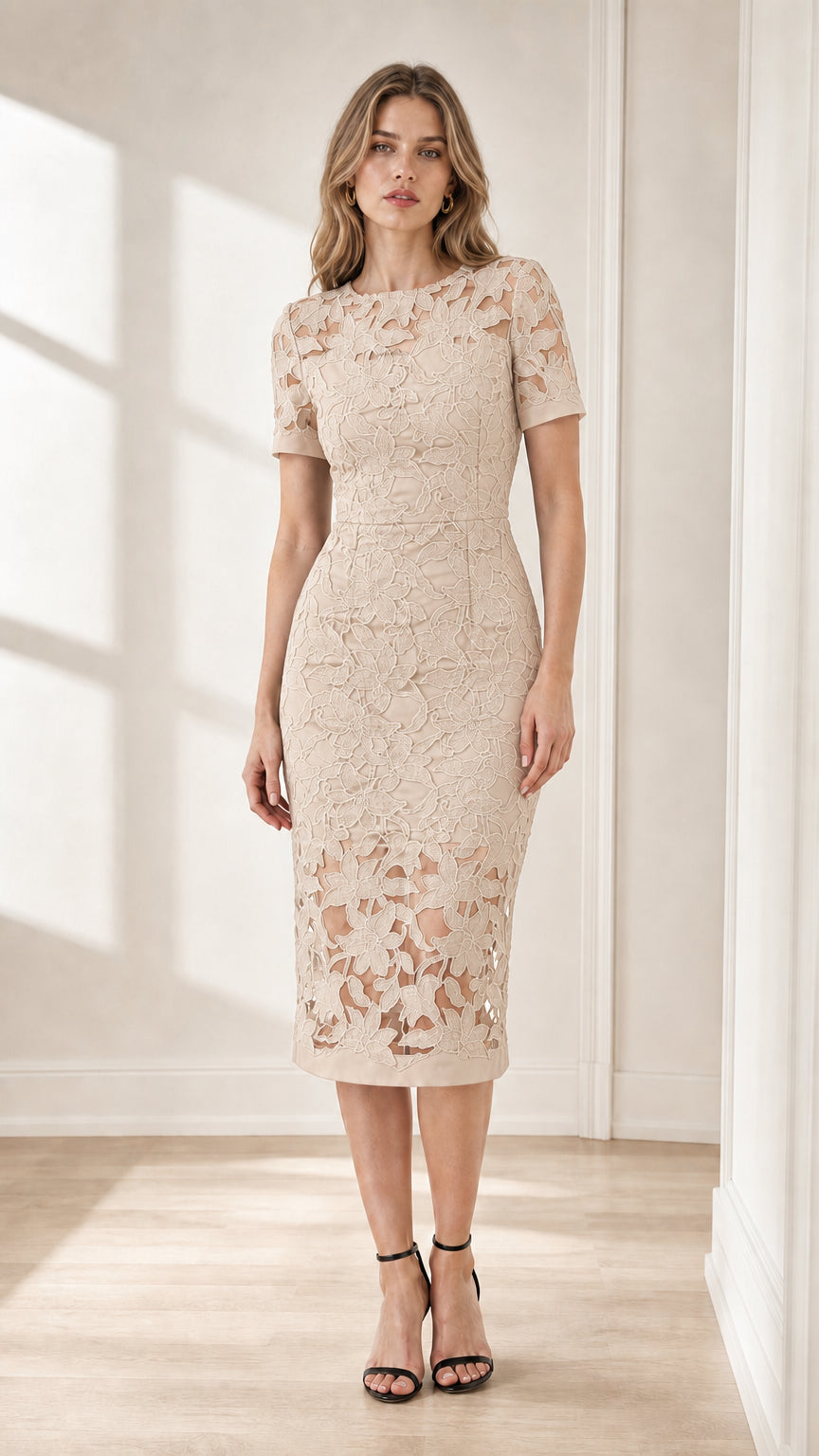 Front view of model wearing champagne beige floral lace midi dress