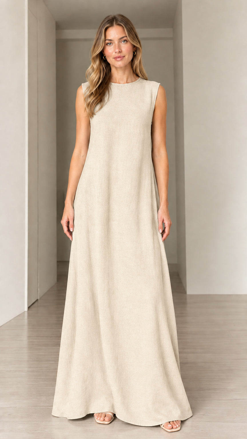 Front view of woman wearing Beige cream sleeveless crewneck maxi dress