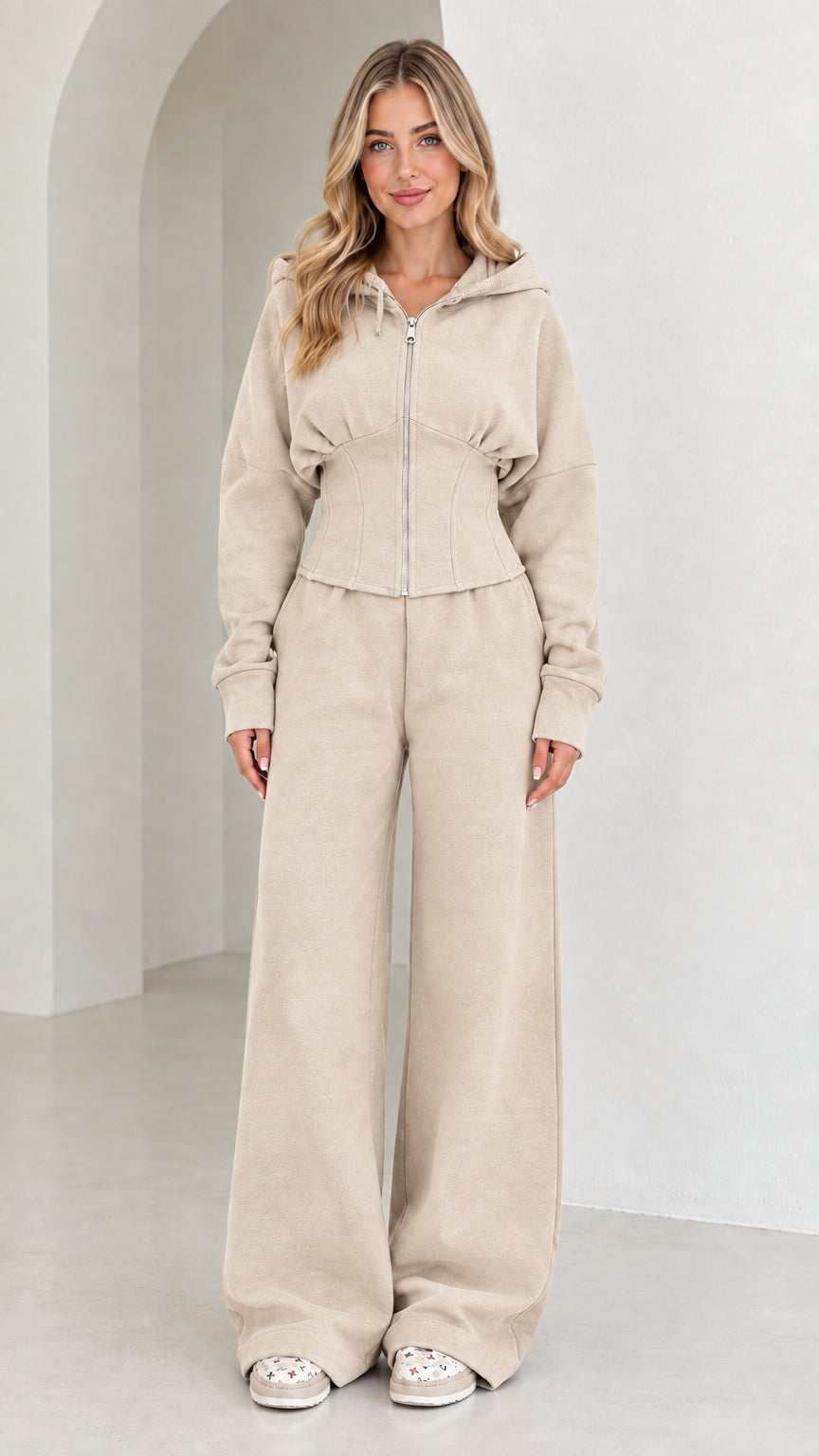 Full-length view of women's corset hoodie and wide-leg sweatpants set in Cream