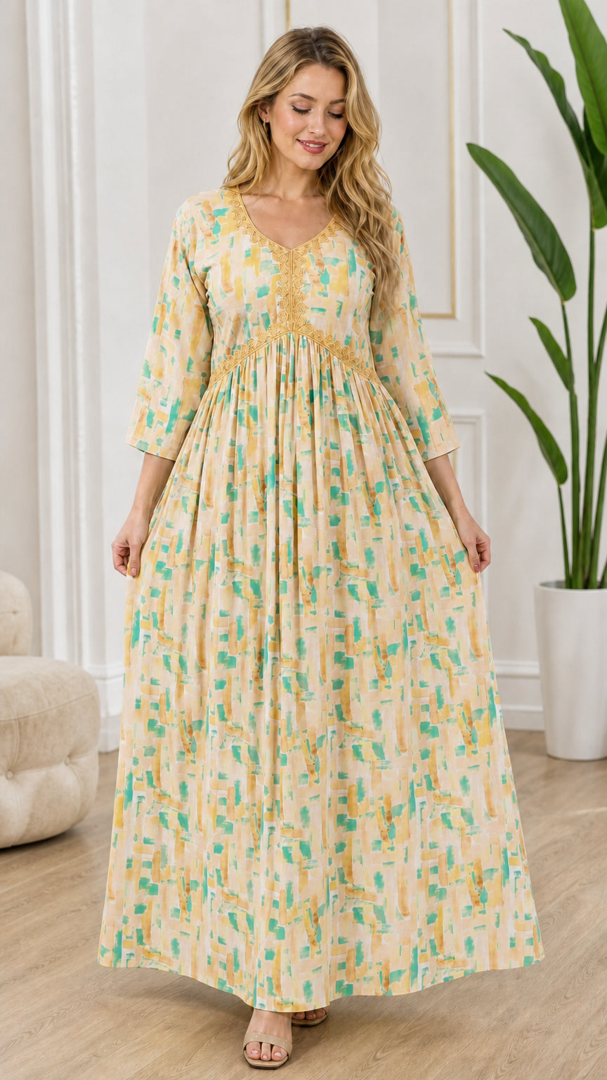 Full-length front view of model wearing light beige and cream abstract print maxi dress