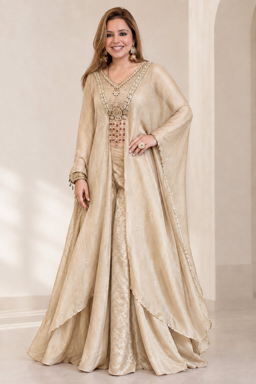 Champagne gold 3-piece cape pant set with flared palazzo trousers and cape