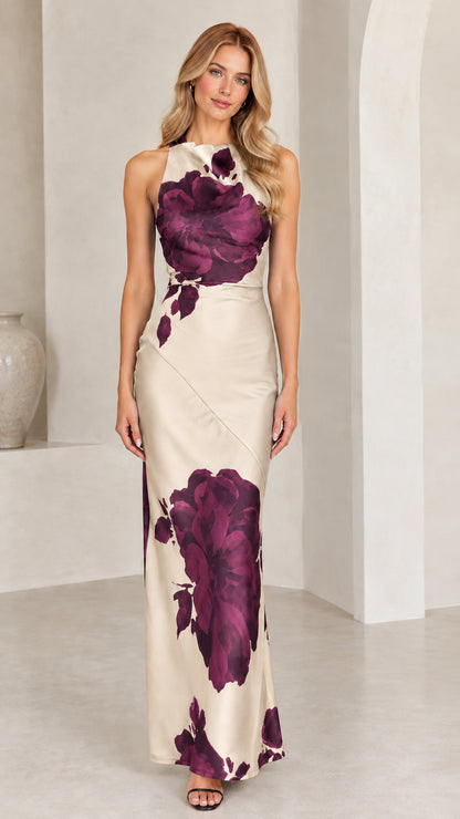 Front view of champagne floral print halter neck satin maxi dress